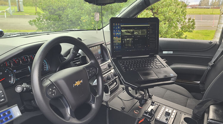 Two deputies are also using in-car cameras as part of a trial this month with the Clark County Sheriff’s Office. They can see right away what the camera picks up, either from the in-car camera or their body-worn cameras. Photo by Paul Valencia