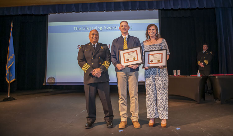 Chief Brennan Blue and Lifesaving Award Recipients Stephen and Blaire Hoobler. Photo courtesy Vancouver Fire Department