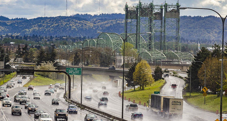 Paving work on southbound Interstate 5 in Vancouver aims to improve safety by installing catch basins to prevent pooling during heavy rainstorms, potentially causing delays for travelers.