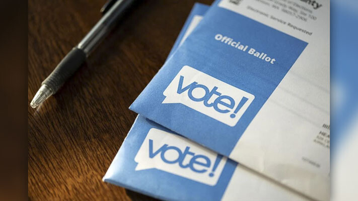 "Vote" logos on mail in ballots for the 2020 Presidential election. Photo courtesy VDB Photos / Shutterstock