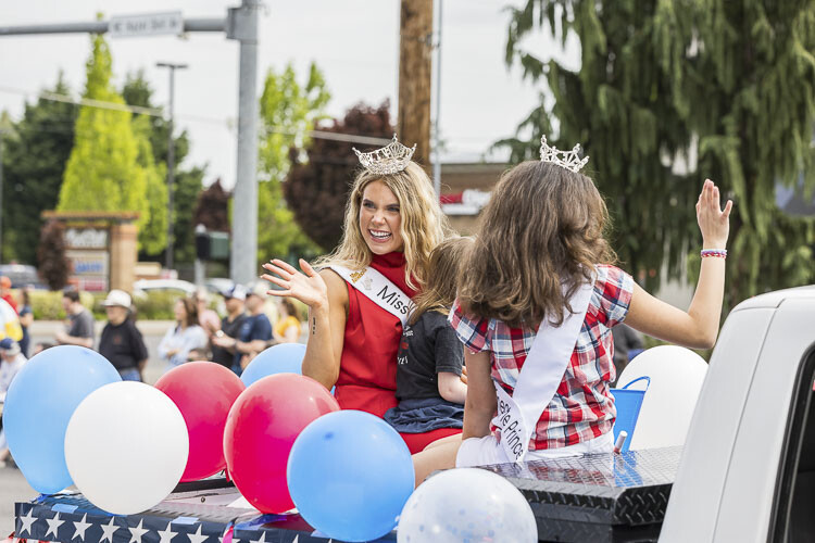 Miss Clark County Vanessa Munson waves to those who gathered Saturday. Photo by Mike Schultz