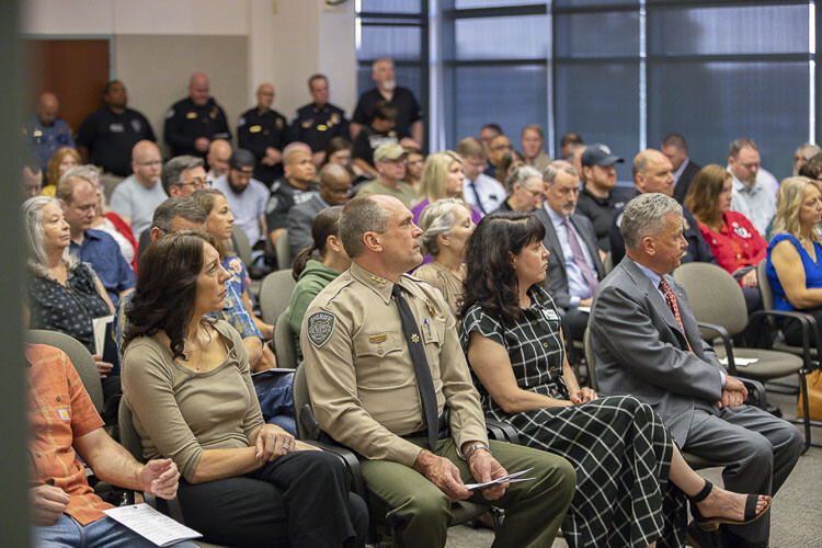 Clark County Sheriff John Horch (in uniform) and Councilors Michelle Belkot (to Horch’s left) and Gary Medvigy (to Belkot’s left) were among the area elected officials in attendance Thursday at the annual Law Enforcement Memorial Ceremony. Photo by Mike Schultz