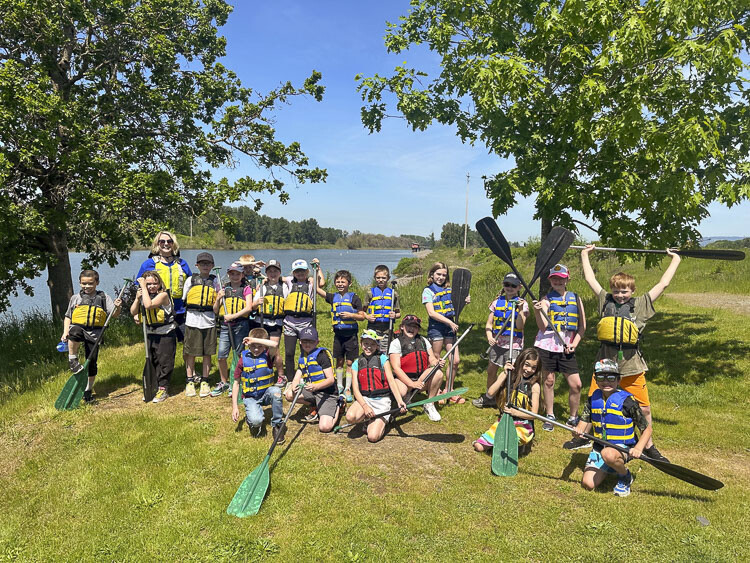 Students explored in the Columbia River in canoes fashioned to look like ones Native American tribes used. Photo courtesy Woodland School District