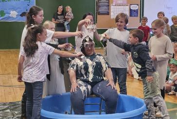 Principal becomes ice cream sundae after fundraiser at Green Mountain School