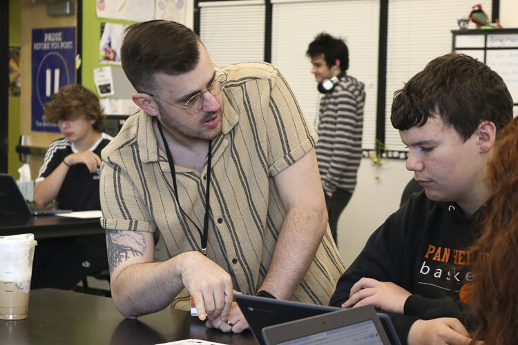 Guest architect Kyle Rogers assists a student in Donna Schatz's engineering class at Washougal High School. Photo courtesy Washougal School District