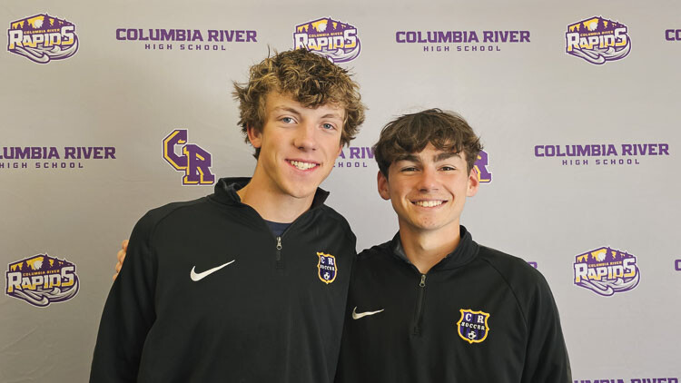 Cole Benner, left, and Hunter Cunningham, two captains from Columbia River boys soccer, say their team was as close as family this season en route to a state championship. Photo by Paul Valencia