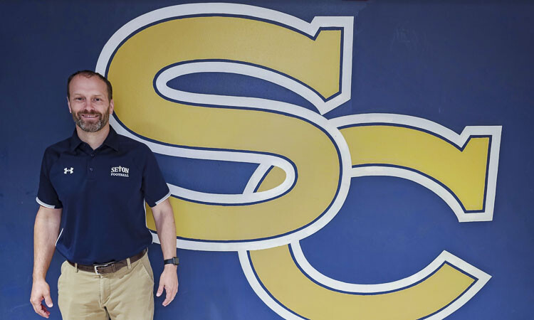 Dan Chase, who was the first head coach of Seton Catholic football in 2011, is returning as the head coach of the Cougars. Photo by Paul Valencia