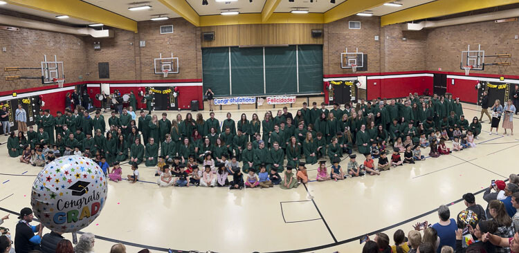 Woodland High School's graduates paraded through the district's schools to inspire younger students to reach graduation. Photo courtesy Woodland School District