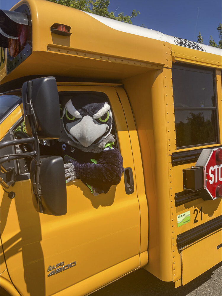 Blitz got behind the wheel to show he is focused on getting books to children, part of the “Camas Book MoBus” program, which brings books to children during the summer months. Photo courtesy Premera Blue Cross