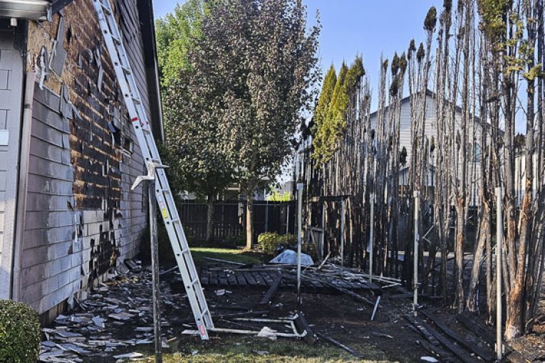 Arborvitae fire spreads to house in Vancouver