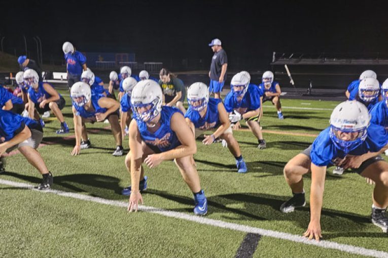 No time to waste at Ridgefield’s midnight football practice
