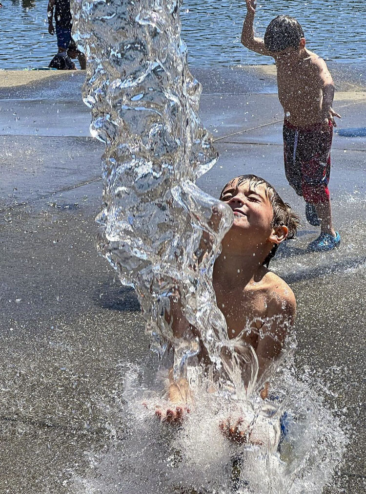 Five-year-old Cash Takach-Smith was found beating the heat at Salmon Creek Park/Klineline Pond Sunday. Photo courtesy Kim Eisenhower