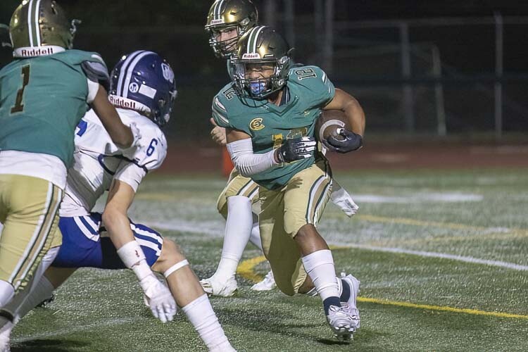 Evergreen running back James Bethune said he is hoping to run over somebody and play his best as he helps lead Evergreen into league play. Photo by Mike Schultz