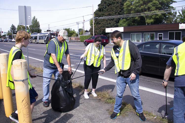 Dozens of volunteers, led by River City Church, cleaned up trash on Fourth Plain Blvd., and nearby streets this past Sunday as part of the church’s mission to serve the community.
