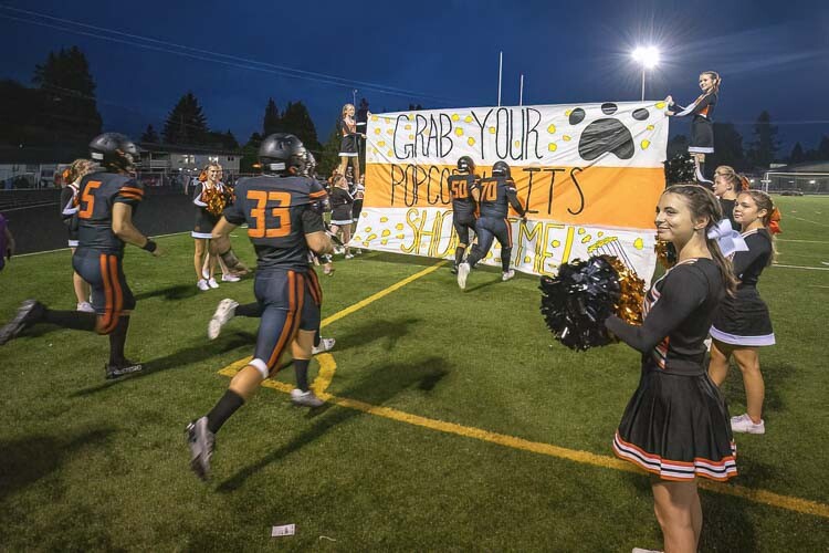 It was not just the football team ready for some football. The Washougal cheer squad has been working all offseason in preparation for the season. Opening night is special for them, too, they said, and they love showing off their school pride. Photo by Mike Schultz