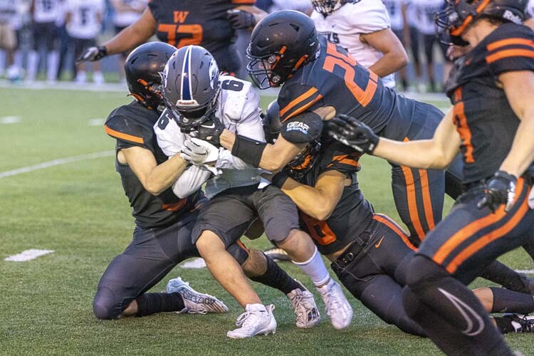 The Washougal defense was as impressive as the offense Thursday night. River Ridge did not score until the closing seconds of a running-clock situation. Photo by Mike Schultz