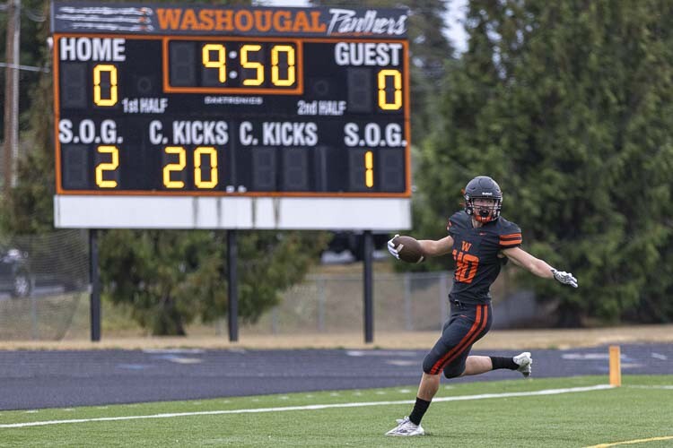 Washougal’s Harry DeShazer scored the first touchdown of the season for all Clark County high school football teams, scoring on a TD pass from quarterback Holden Bea on Thursday. Photo by Mike Schultz
