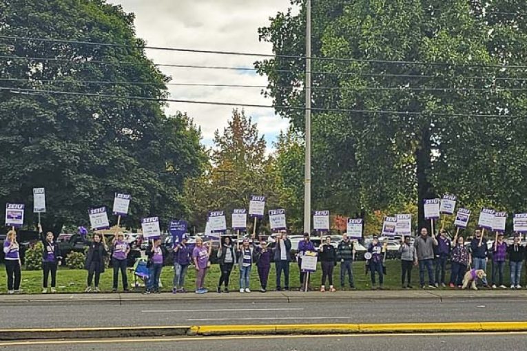 Health care workers strike as thousands join the picket line