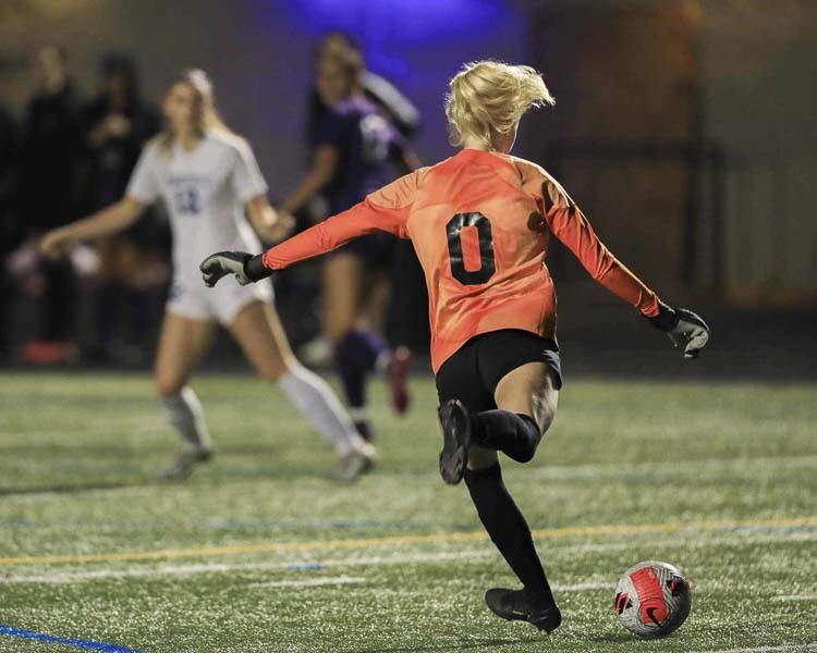 Columbia River Goalkeeper Bella Graves free kicks to start an offensive push during the Rapids’ 1-0 win over Ridgefield. Photo courtesy Chris Barker