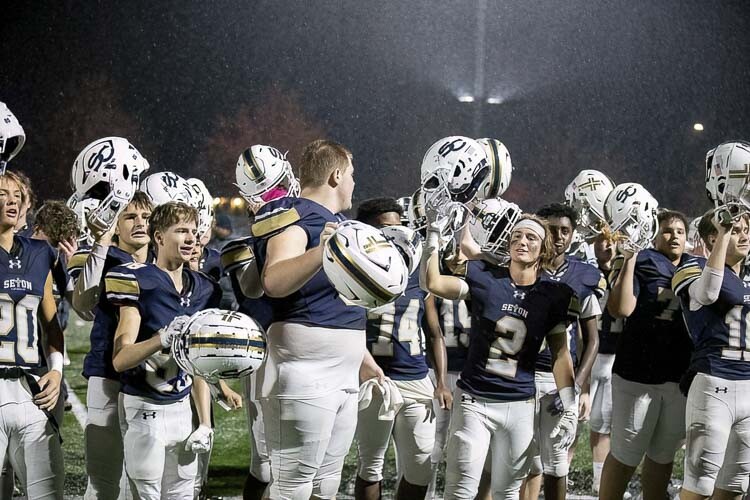 The Seton Catholic Cougars, shown here earlier this season, still have reason to celebrate. They have reached the state semifinals for the first time in program history. Photo by Mike Schultz