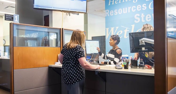 Staff assisting a customer at the city of Vancouver Permit Center counter. Photo courtesy city of Vancouver