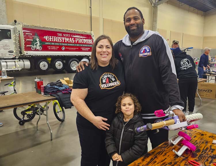 Sara Hill, Curtis Hill, and their son D’Angelo took part in the Bike Build, representing the Vancouver Volcanoes. Photo by Paul Valencia