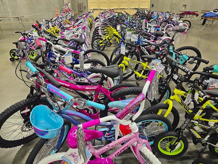 In all, more than 800 bicycles were expected to be assembled at the Bike Build for the Scott Campbell Christmas Promise. Campbell’s dream is that every child in need receives a bicycle for Christmas. Photo by Paul Valencia