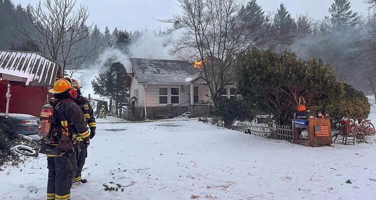 Firefighters battled wind and cold temperatures, and water supply challenges along with a house fire on Blair Road Saturday (Jan. 13) afternoon and into the evening.