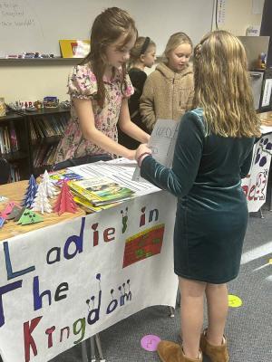 During the Medieval Fair's student store, students sold homemade arts and crafts for currency earned during their lessons. Photo courtesy Woodland School District