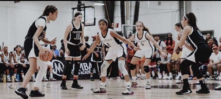 This is a photo of Gigi Bryant, playing defense in the middle, during her last game. Ava Smith, now a senior at Union High School, is on the far right in this photo. Photo courtesy Smith family