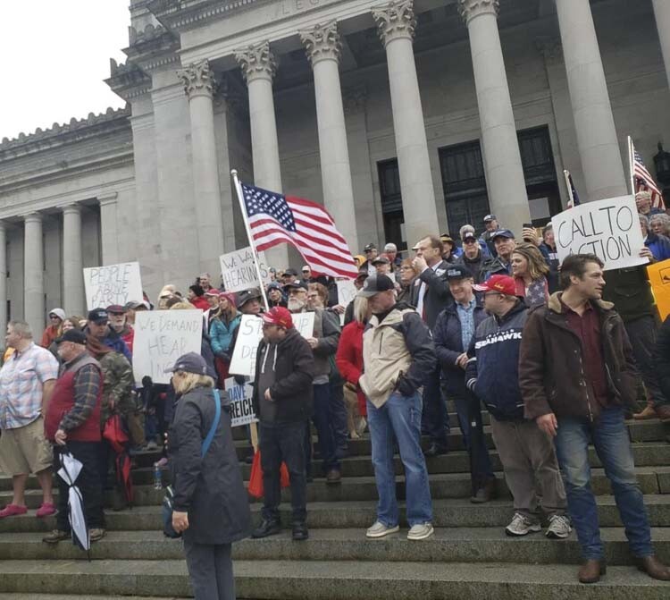 Supporters of six certified initiatives to the Legislature rallied in Olympia, calling for the initiatives to get hearings before lawmakers. Photo courtesy Brett Davis 