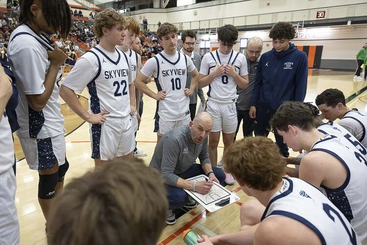 The Skyview Storm and coach Matt Gruhler, shown here last week at the state regionals, have advanced to the state quarterfinals. Photo by Mike Schultz