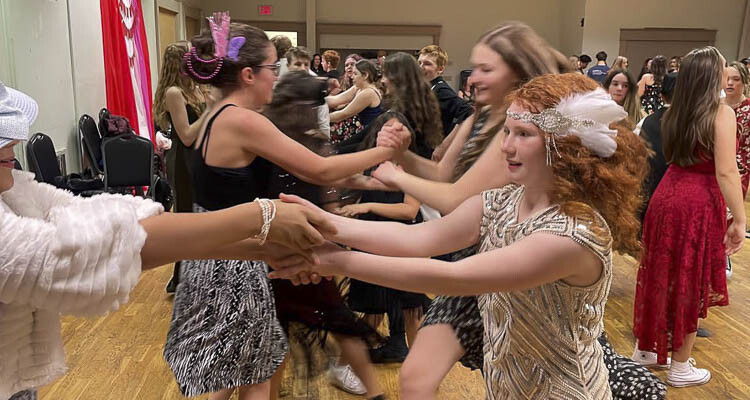 Today, with over 700 members of her Clark County-specific Facebook group, Amy Brown can rent a venue and post an event with only four days’ notice and expect a crowd to show up, paying a small admission fee to learn and dance with friends. Photo courtesy Amy Brown