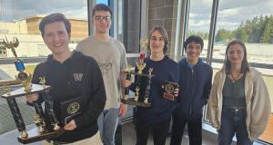 Ridgefield High School is the two-time reigning state champion in Knowledge Bowl, a trivia competition testing the skills and speed of students, and the key to success is a chemistry between not just the varsity competitors but every talented student in the program.