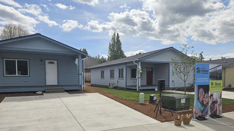 It was a beautiful spring day to welcome two new families into the Johnson Village subdivision in east Vancouver, courtesy of Habitat for Humanity. Photo by Paul Valencia