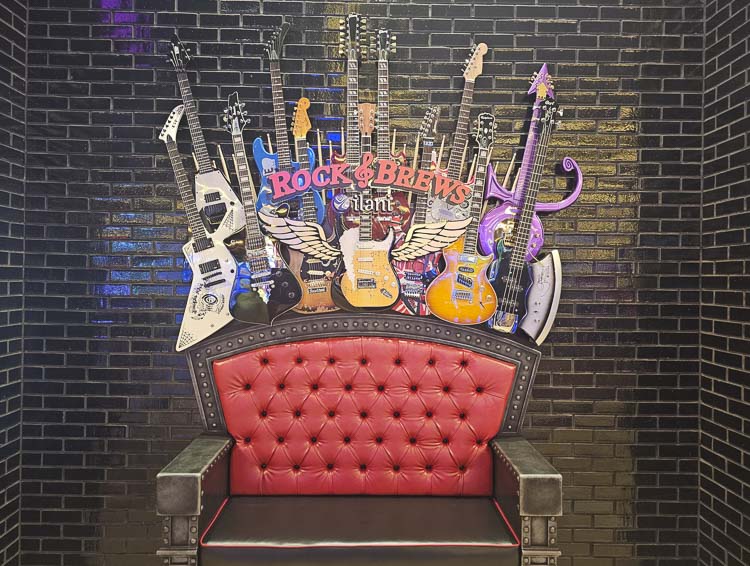 Guitars from famous acts welcome folks to Rock & Brews at ilani, which had its grand opening last week. Photo by Paul Valencia