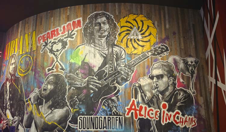 There is a wall at Rock & Brews at ilani dedicated to the Seattle Sound. Photo by Paul Valencia