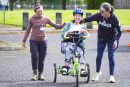 Students with special needs get free bike lessons in cross-district event