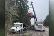 Car carrier semi-truck goes off the road on Highway 14
