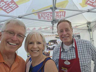 Tim (right) has over 40 years with In-N-Out, sporting a ring with four diamonds, one for each decade. He now serves as a corporate historian, sharing tons of details and fun trivia. Shown on left is Rep. John Ley and Liz Cline (center). Photo courtesy Rep. John Ley
