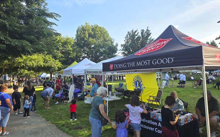 Dozens of social organizations and local businesses met with hundreds of neighbors at LeRoy Haagen Memorial Park on Tuesday as part of National Night Out.
