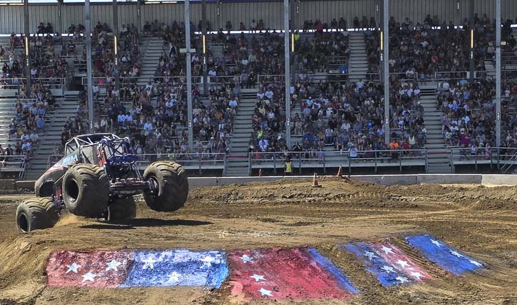 The Monster Trucks are always a big draw, even when the temperature soars into the 90s, at the Clark County Fair. Photo by Paul Valencia