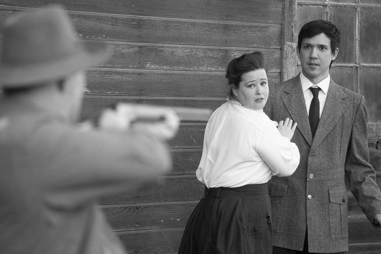 Laura Henderson as Essie and Cody Swires as Jamie react to having a weapon pointed their way by Michael Reid as Hiram in the upcoming play, “There’s Still Snow on Silver Star.” The play will open Sept. 12 at Love Street Playhouse in Woodland. Photo by Bobby Pallotta