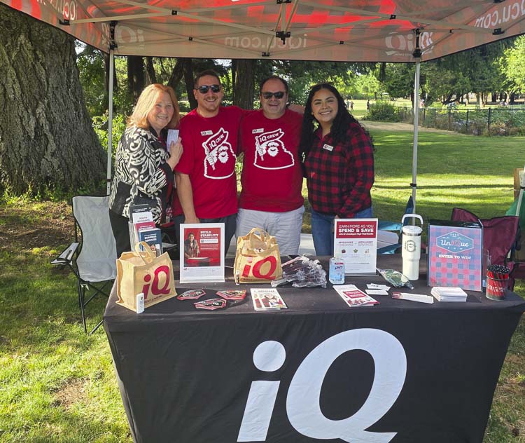 Vancouver Mayor Anne McEnerny-Ogle visited with many vendors Tuesday night, including the folks at IQ Credit Union, as part of her tour of the nine National Night Out celebrations in Vancouver. Photo by Paul Valencia