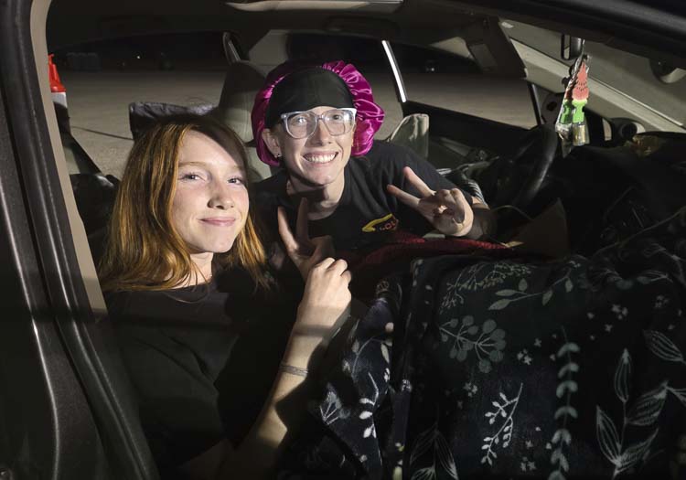 Sisters Maddy and Abby Bailey of Longview medaled, if you will. They were third in line for the In-N-Out Burger opening, and that’s good enough for a podium finish Abby said. Photo by Paul Valencia