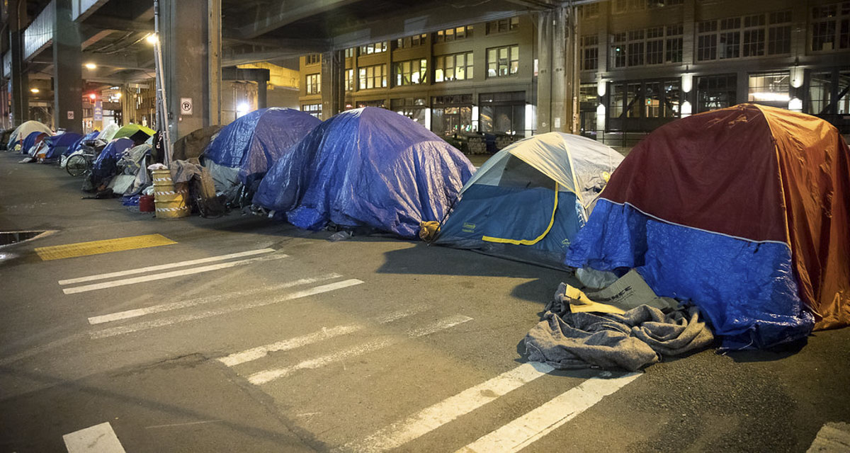 Mark Harmsworth argues that uncontrolled homeless camps harm public safety, businesses, and community spaces, and calls for paired enforcement and supportive services to address root causes.