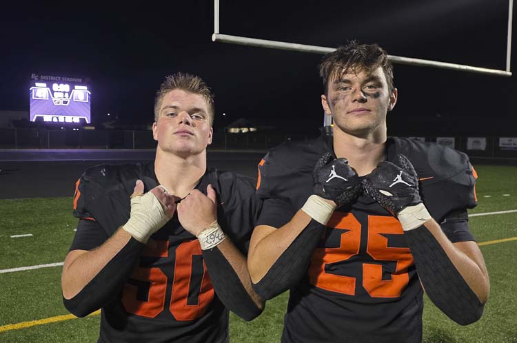 Emet Ordway (left) and Thomas Avery proud to be part of BG Tough, the attitude that has led Battle Ground football to a 3-0 start this football season. Photo by Paul Valencia