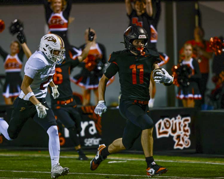 Battle Ground’s Broderick Heerlein breaks free for a long touchdown reception against Prairie on Friday night. Photo courtesy Chris Barke