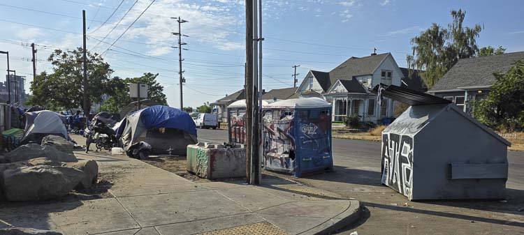 The City of Vancouver says it has clean-up operations every other week at the homeless camps near the Share House. Photo by Paul Valencia