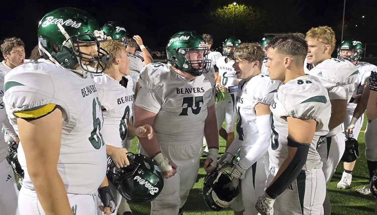 Isaiah Mattison might cover up his hair during football games, but that beard makes it quite clear why he is called Big Red at Woodland High School. Mattison is a team leader on the football team as well as a school leader, one who supports all things Woodland. Photo by Paul Valencia